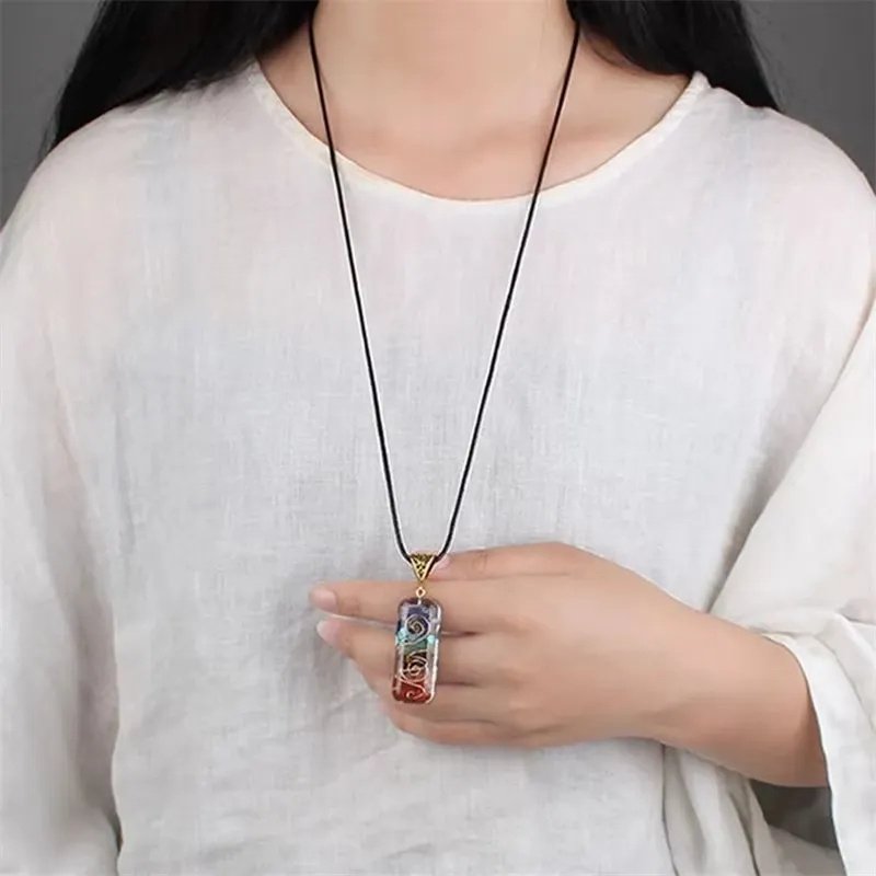 Woman wearing a Livora Dream crystal pendant necklace
